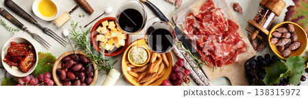 Wine and Charcuterie Board with Cheese Olives and Snacks Wine and Charcuterie Board with Cheese Olives and Snacks 138315972