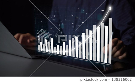 Hands of a Business Professional Analyzing Financial Data with Technology and Graphical Representation of Growth on a Modern Laptop Display Copula Hands of a Business Professional Analyzing Financial Data with Technology and Graphical Representation of Growth on a Modern Laptop Display Copula 138316002