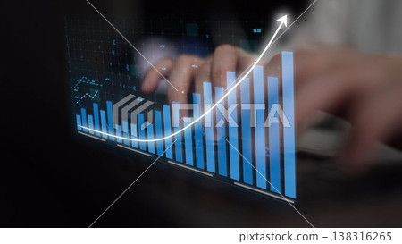 Hands typing on laptop keyboard with digital graph and rising trend line, symbolizing financial growth, business success, and data analysis in modern technology Copula Hands typing on laptop keyboard with digital graph and rising trend line, symbolizing financial growth, business success, and data analysis in modern technology Copula 138316265