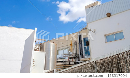 Food Processing Factory Exterior with Storage Tanks and Pipes Food Processing Factory Exterior with Storage Tanks and Pipes 138317094