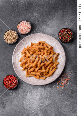 Croutons or crackers made from rye bread with garlic, salt, and spices. Croutons with salt 138318515