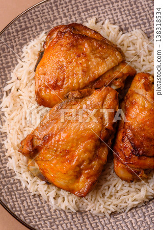 Kabsa or haneeth, an Arabic dish with rice and chicken, salt, and spices. Kabsa or haneeth 138318534