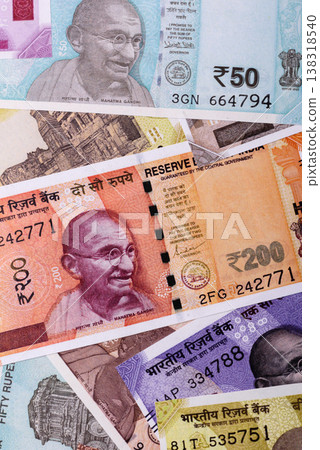 Indian paper currency, rupees, for financial transactions and exchange. Indian rupee currency Indian paper currency, rupees, for financial transactions and exchange. Indian rupee currency 138318540