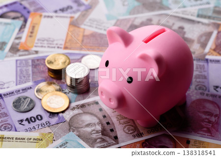 A piggy bank as a concept for storing, accumulating, and saving financial resources. A piggy bank A piggy bank as a concept for storing, accumulating, and saving financial resources. A piggy bank 138318541