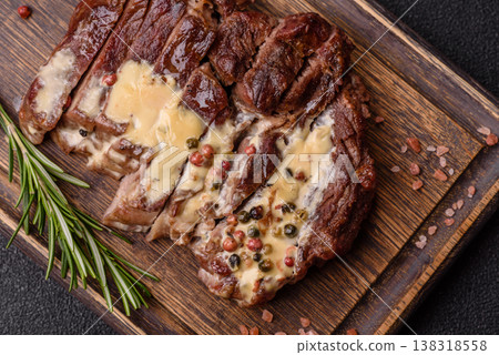 Steak, beef or pork meat grilled or barbecued with salt and spices. Beef steak 138318558
