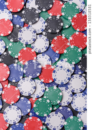 Multicolored casino chips as a conceptual backdrop for poker, blackjack. Multicolored casino chips Multicolored casino chips as a conceptual backdrop for poker, blackjack. Multicolored casino chips 138318581