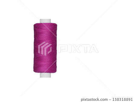 purple spool of sewing thread isolated on white background purple spool of sewing thread isolated on white background 138318891