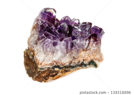 Amethyst Crystal Druse macro mineral on white background Amethyst Crystal Druse macro mineral on white background 138318896