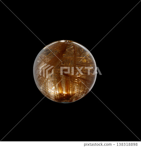 Ball of quartz with rutile on a black background 138318898