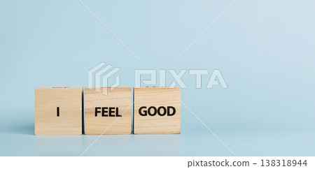 Wooden cubes with inscriptions I Feel Good on a blue background Wooden cubes with inscriptions I Feel Good on a blue background 138318944