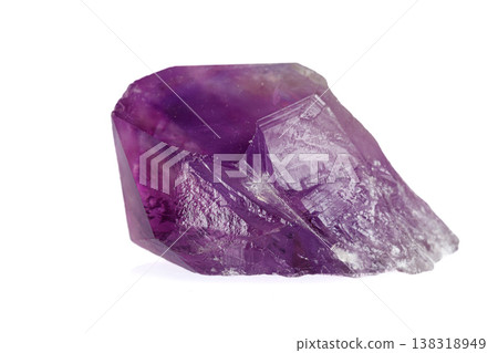 Amethyst mineral stone macro on white background Amethyst mineral stone macro on white background 138318949