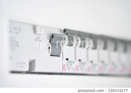 Electrical circuit breaker panel with RCD test button 138319277