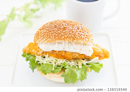 Delicious tartar fish sandwich and coffee 138319340
