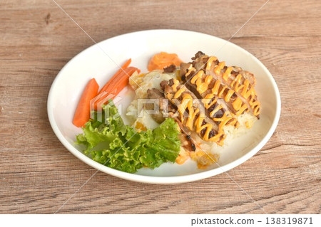 grilled chicken dressing cheese with fried cream egg omelet and vegetable salad on rice in plate 138319871