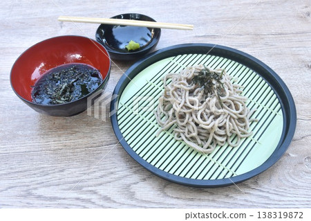 boiled cold yakisoba or zuru soba Japanese noodles topping dry slice seaweed on plate dipping soy sauce boiled cold yakisoba or zuru soba Japanese noodles topping dry slice seaweed on plate dipping soy sauce 138319872