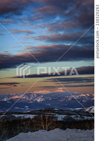 A winter morning view from Mashu First Observatory: A fantastical landscape woven from the sky and snow-capped mountains. A winter morning view from Mashu First Observatory: A fantastical landscape woven from the sky and snow-capped mountains. 138320263