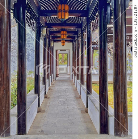 Chinese garden corridor and lanterns: Symmetrical traditional architectural pathway (background material) Chinese garden corridor and lanterns: Symmetrical traditional architectural pathway (background material) 138321297