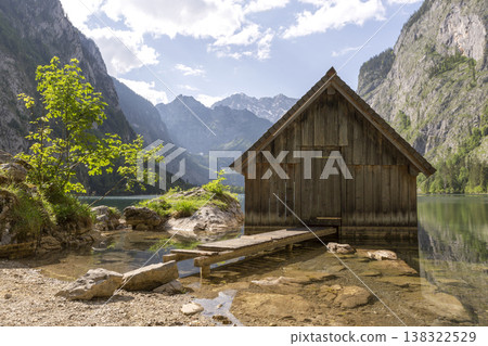 Small boathouse at lake Obersee, lake Konigssee, in the Berchtesgaden Alps, Bavaria, Germany Small boathouse at lake Obersee, lake Konigssee, in the Berchtesgaden Alps, Bavaria, Germany 138322529