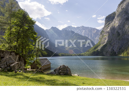 Small boathouse at lake Obersee, lake Konigssee, in the Berchtesgaden Alps, Bavaria, Germany Small boathouse at lake Obersee, lake Konigssee, in the Berchtesgaden Alps, Bavaria, Germany 138322531