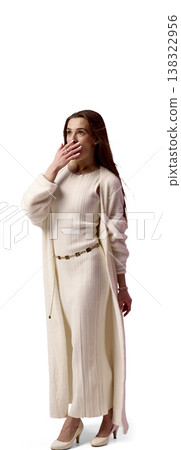 Young woman surprised covering mouth isolated on white background Young woman surprised covering mouth isolated on white background 138322956