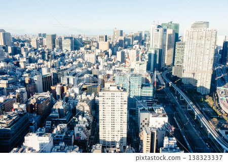 The urban skyline of Tokyo, lined with skyscrapers. The urban skyline of Tokyo, lined with skyscrapers. 138323337