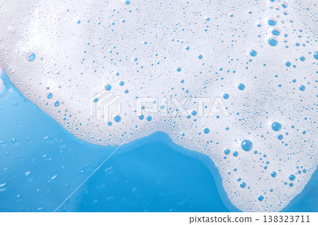 Transparent water droplets on light blue background, skincare serum texture and hydration concept Transparent water droplets on light blue background, skincare serum texture and hydration concept 138323711