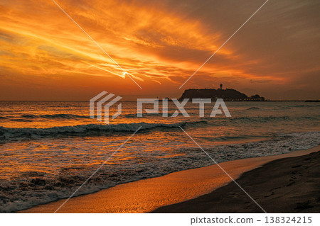 The sunset over the sea and Enoshima Island The sunset over the sea and Enoshima Island 138324215