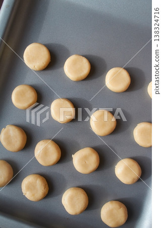 Unbaked Cookie Dough Balls on Baking Sheet Unbaked Cookie Dough Balls on Baking Sheet 138324716