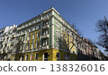 Exploring colorful buildings on a sunny day in Prague with clear blue sky above 138326016