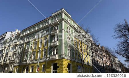 Exploring colorful buildings on a sunny day in Prague with clear blue sky above Exploring colorful buildings on a sunny day in Prague with clear blue sky above 138326016