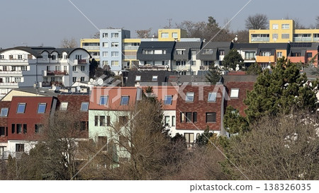 View of residential buildings in Prague with a mix of colors and styles during clear weather in the city View of residential buildings in Prague with a mix of colors and styles during clear weather in the city 138326035