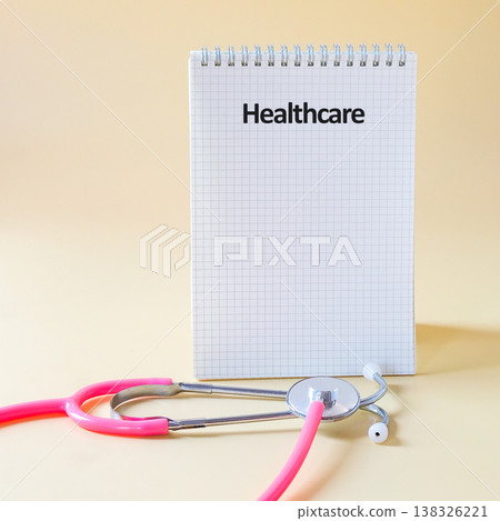 Healthcare words on notepad .Insurance, Wellness and medical concept. Healthcare words on notepad .Insurance, Wellness and medical concept. 138326221