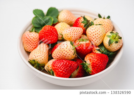 Strawberry red and white berry fruits in a bowl, isolated, abstract food background, top view with copy space Strawberry red and white berry fruits in a bowl, isolated, abstract food background, top view with copy space 138326590