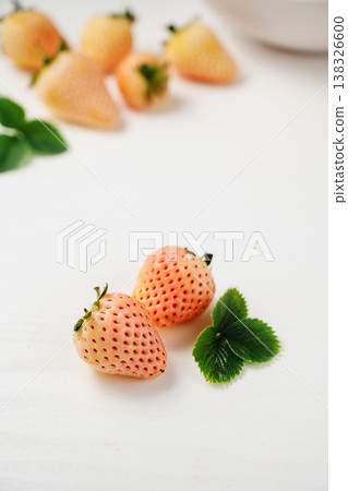 White pink strawberry, berry fruits with leaves on white background, copy space White pink strawberry, berry fruits with leaves on white background, copy space 138326600