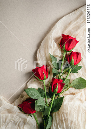 Mother's Day or Valentine's Day background. Red rose flowers on neutral background. Greeting card template, copy space Mother's Day or Valentine's Day background. Red rose flowers on neutral background. Greeting card template, copy space 138326868