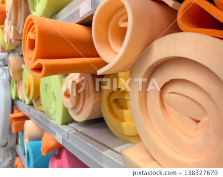 Colorful foam rolls displayed in a bright craft store 138327670