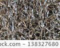 Crumpled reflective aluminum foil surface texture with metallic abstract highlights 138327680