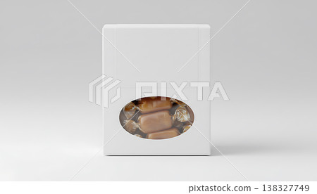 Blank white food packaging box displays sweet caramel candies in studio light Blank white food packaging box displays sweet caramel candies in studio light 138327749