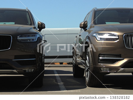 Same vehicles staying in line on the street Same vehicles staying in line on the street 138328182