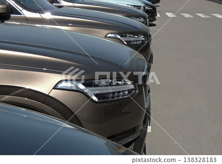 Line of same vehicles on the asphalt  138328183