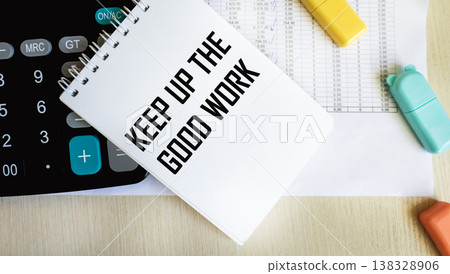 Text Keep up the good works on the notepad , next to the calculator Text Keep up the good works on the notepad , next to the calculator 138328906