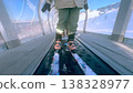 Little Child Riding Covered Magic Carpet Lift On Skis At Ski Resort Close Up, French Alps 138328977