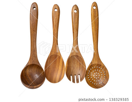 wooden kitchen spoons isolated on a white background wooden kitchen spoons isolated on a white background 138329385