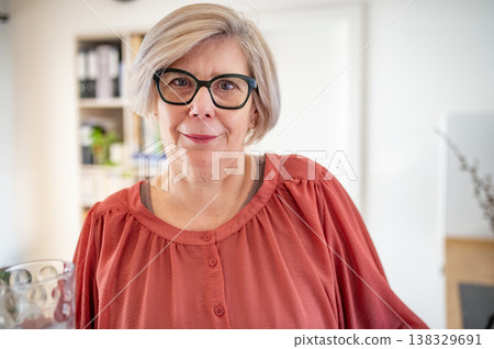 Portrait of elderly woman at home. Portrait of elderly woman at home. 138329691