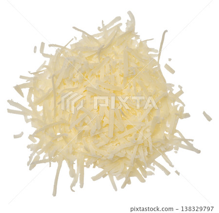 A handful of grated light-colored hard cheese piled up on an isolated background, top view A handful of grated light-colored hard cheese piled up on an isolated background, top view 138329797