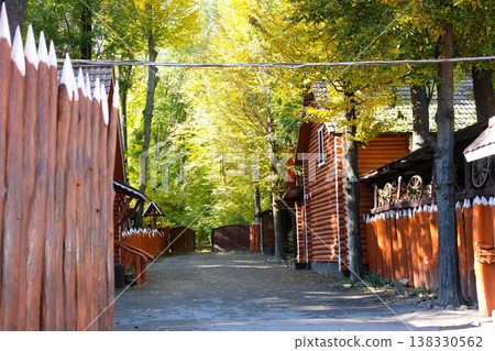 Wooden pointed fence Tall Wooden Fence with Pointed Pickets and Minimalist Decking Wooden pointed fence Tall Wooden Fence with Pointed Pickets and Minimalist Decking 138330562