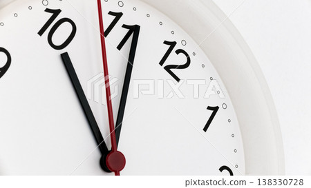Closeup clock ticking showing ten hours 138330728