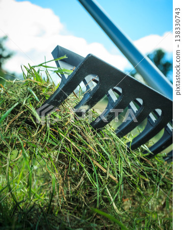 Person raking leaves Person raking leaves 138330743