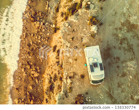 Rv caravan on spanish rocky coast. Aerial view 138330774