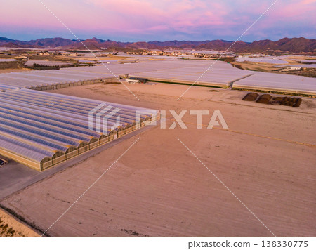 Aerial view. Commercial greenhouses on coast, Spain. Aerial view. Commercial greenhouses on coast, Spain. 138330775